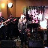 (l. to r.) Michael Powers - Lead Vocals, Guitar Greg Munoz - Bass Julie Peralta - Lead and Backing Vocals Roger Peralta - Percussion Jerald Henry - Lead and Rhythm Guitar