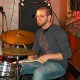 Michael Gisi – drums