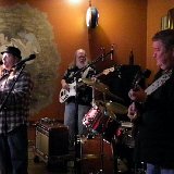 Mark Cavender (center) - bass &#38; vox