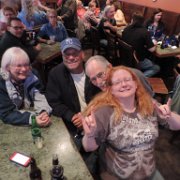At the table with Jennifer Falley (Dan Falley's daughter) and Joel Edison (Jam4Dan Vice President and Luthier, just behind Jennifer) is Jennifer's parents.